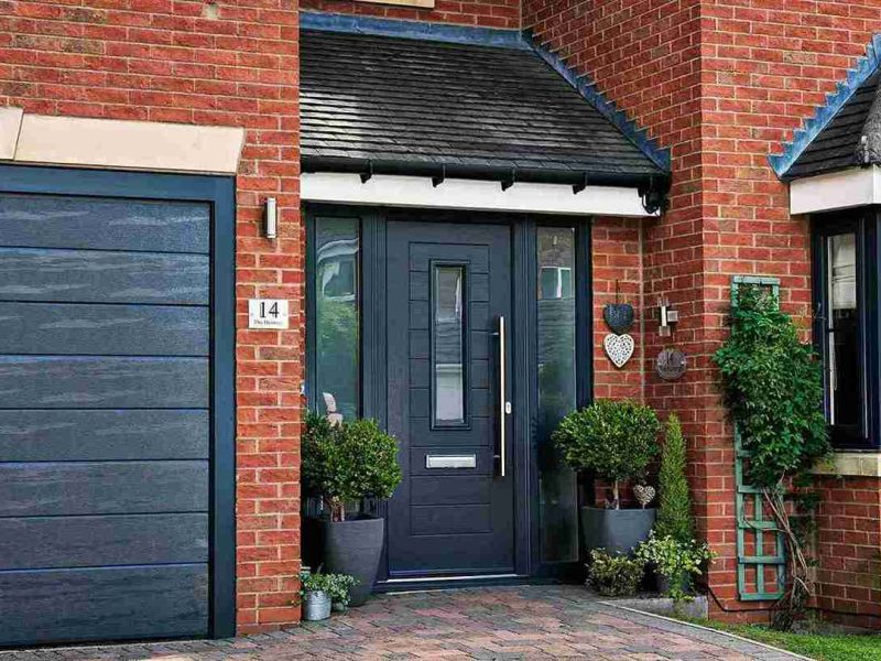 A navy blue composite door for a Dorset home.