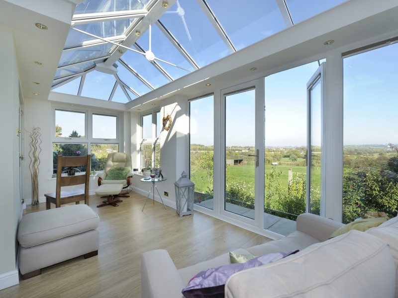 An inside shot of a white t-shape conservatory in Dorset.